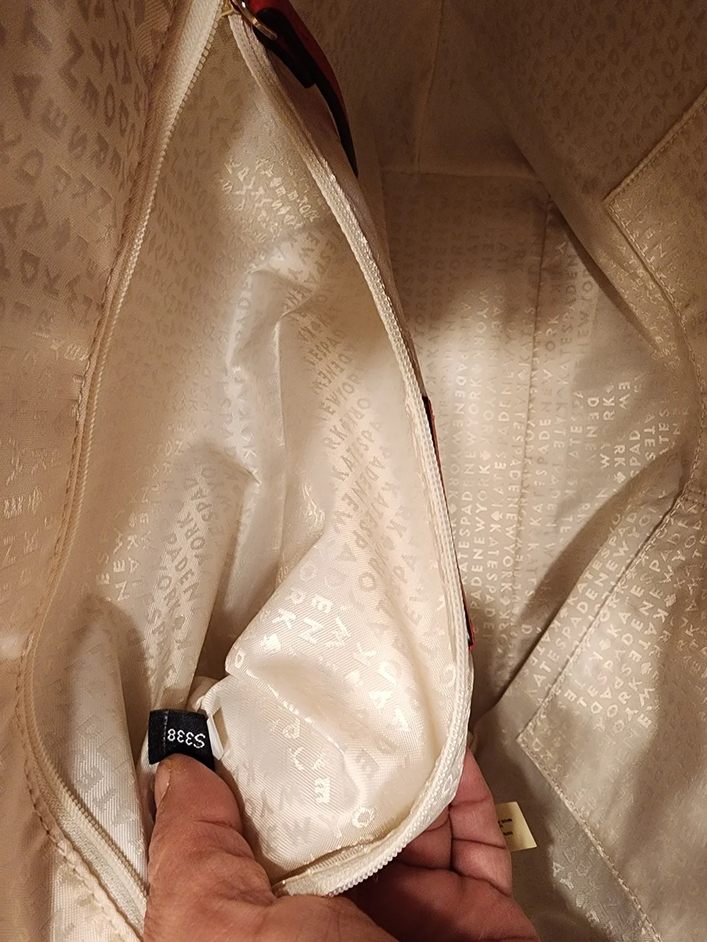 This Kate Spade Larchmont Avenue Logo Penny Tote in chili red